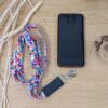 Lanière pour téléphone en tissu fleuri multicolore, accessoire fait main pratique et coloré, idéal pour ajouter une touche de gaieté