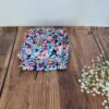 accessoire textile cousu main tissu moucheté multicolore